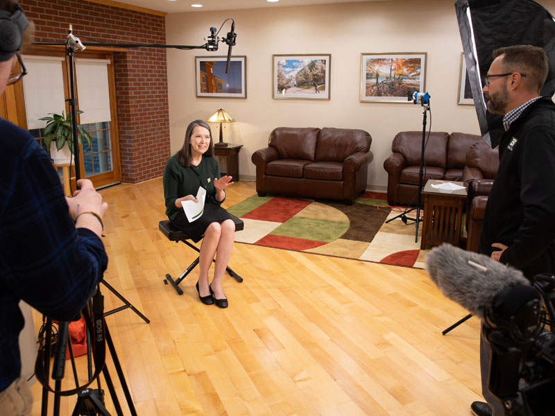 President Anne prepares for a video shoot.