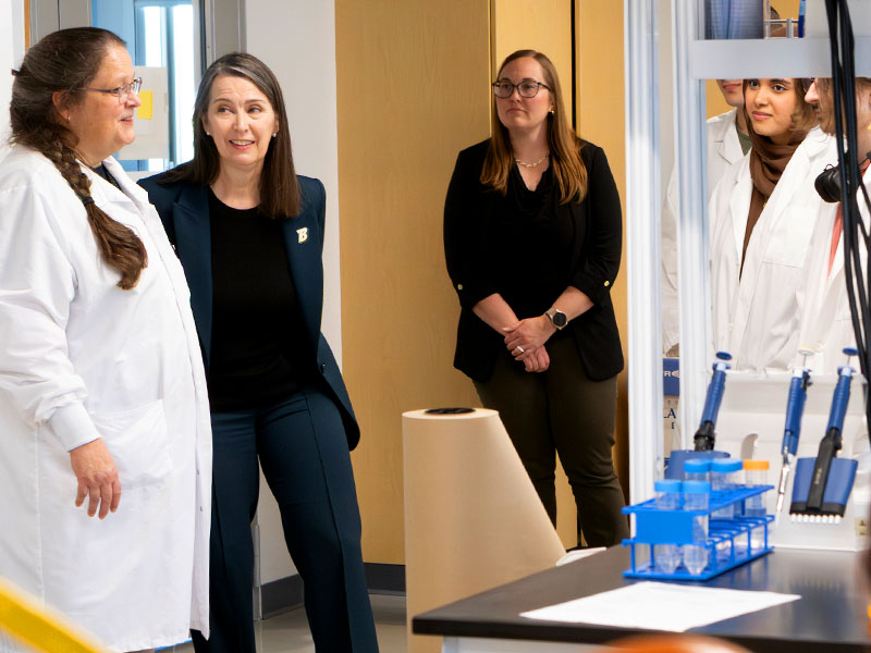 President Anne visits the Pharmacy School.