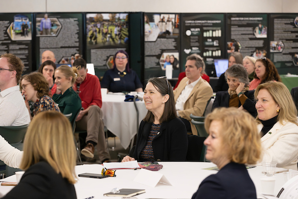 President D'Alleva listens to a speaker at the Carnegie classification celebration for community engagement. President D'Alleva listens to a speaker at the Carnegie classification celebration for community engagement.