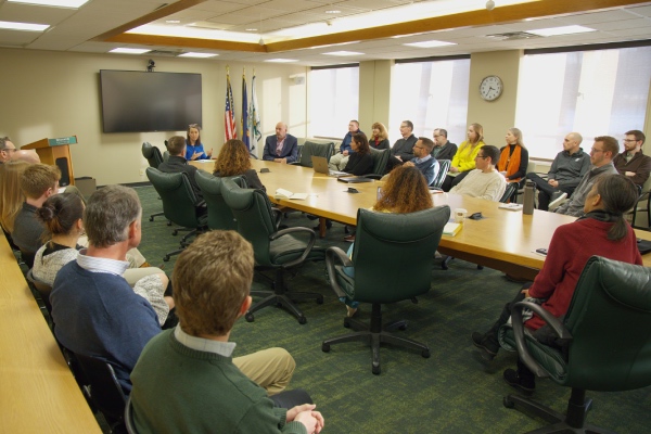 President Anne D'Alleva speaks with staff from the Division of Communications and Marketing