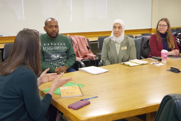 President D'Alleva speaks with members of the Professional Staff Senate Executive Committee