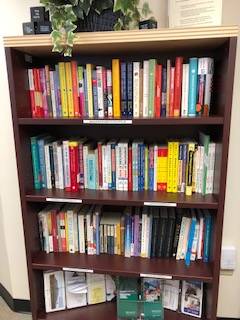 a small bookshelf stocked with books