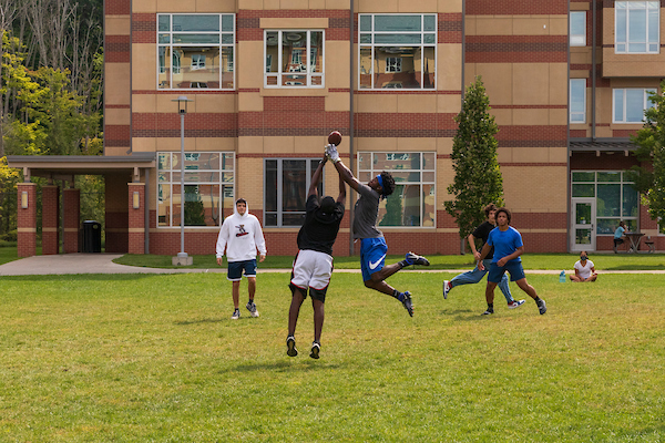 Dickinson students playing co-rec football.