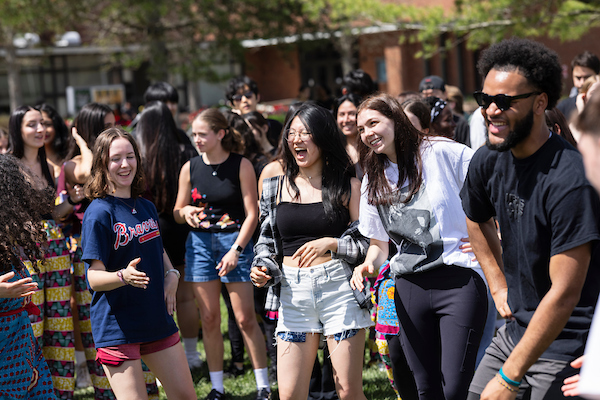 Students having fun on Dickinson's turf field.