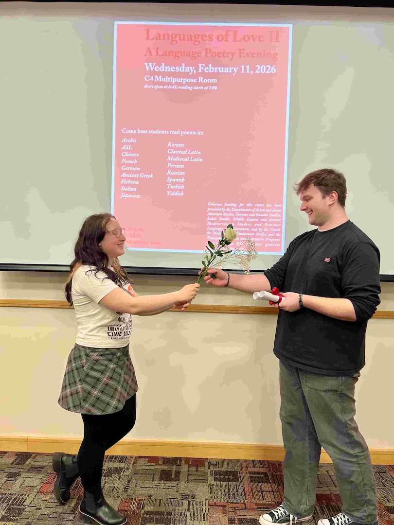 Students Aidan Niebauer and Cadi Darling at the Second Annual “Languages of Love” Poetry Event