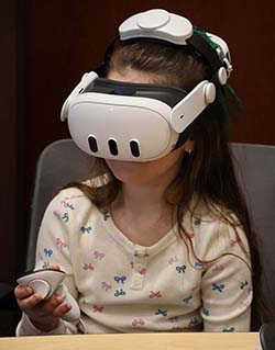 child in vr headset