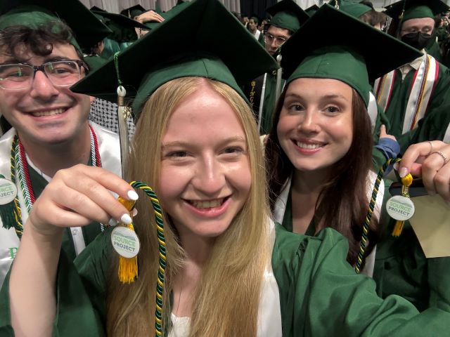 Jacob Gressin, Lia Richter, and Rachel Lastowski at Commencement, members of the Disinformation Source Project stream