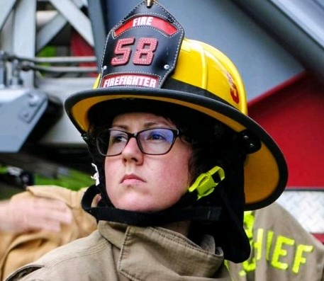 Sasha Noble in Firefighter Gear Headshot